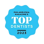 A badge stating that Tanzilli Orthodontics was voted one of Philadelphia Magazine's Top Dentists in 2023