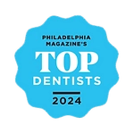 A badge stating that Tanzilli Orthodontics was voted one of Philadelphia Magazine's Top Dentists in 2024
